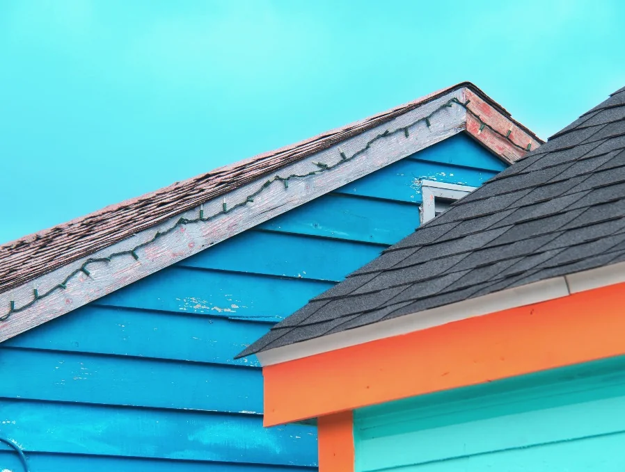 Colourful houses with shingle roofs